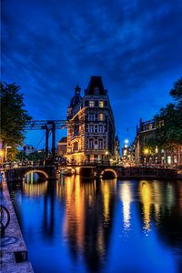 Preview wallpaper building, night city, bridge, reflection, lights