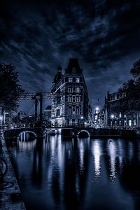 Preview wallpaper building, night city, facade, bridge, river