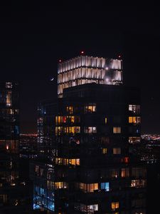 Preview wallpaper building, night city, windows, architecture