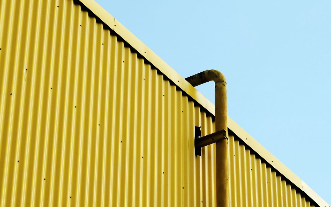 1280x800 Wallpaper building, pipe, yellow, minimalism