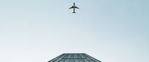 Preview wallpaper building, plane, sky, minimalism