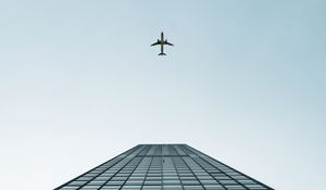 Preview wallpaper building, plane, sky, minimalism