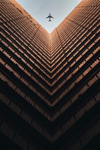Preview wallpaper building, plane, sky, symmetry, architecture