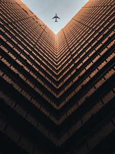Preview wallpaper building, plane, sky, symmetry, architecture