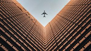 Preview wallpaper building, plane, sky, symmetry, architecture