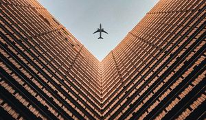 Preview wallpaper building, plane, sky, symmetry, architecture