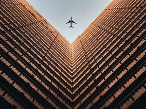Preview wallpaper building, plane, sky, symmetry, architecture