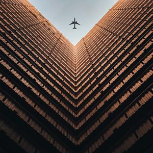 Preview wallpaper building, plane, sky, symmetry, architecture