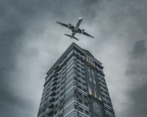 Preview wallpaper building, plane, sky, gray