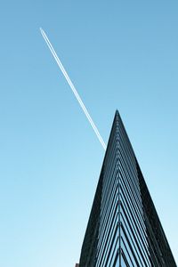 Preview wallpaper building, plane, trail, sky, minimalism