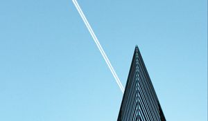 Preview wallpaper building, plane, trail, sky, minimalism