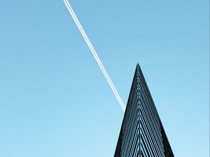 Preview wallpaper building, plane, trail, sky, minimalism