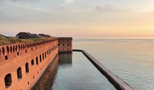Preview wallpaper building, pool, sea, grass