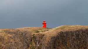 Preview wallpaper building, red, mountain, rock, cliff, sky, nature