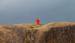 Preview wallpaper building, red, mountain, rock, cliff, sky, nature