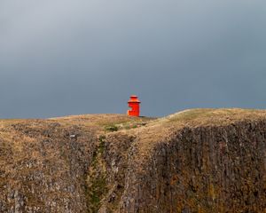 Preview wallpaper building, red, mountain, rock, cliff, sky, nature