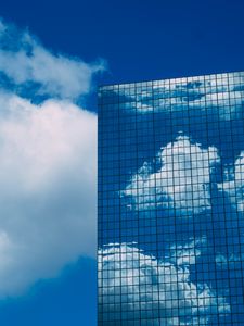 Preview wallpaper building, reflection, facade, glassy, clouds, sky