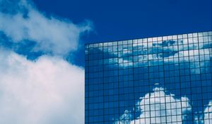 Preview wallpaper building, reflection, facade, glassy, clouds, sky