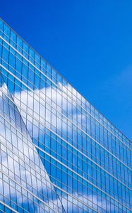 Preview wallpaper building, reflection, sky, clouds, minimalism