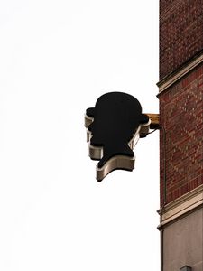 Preview wallpaper building, sign, head, wall