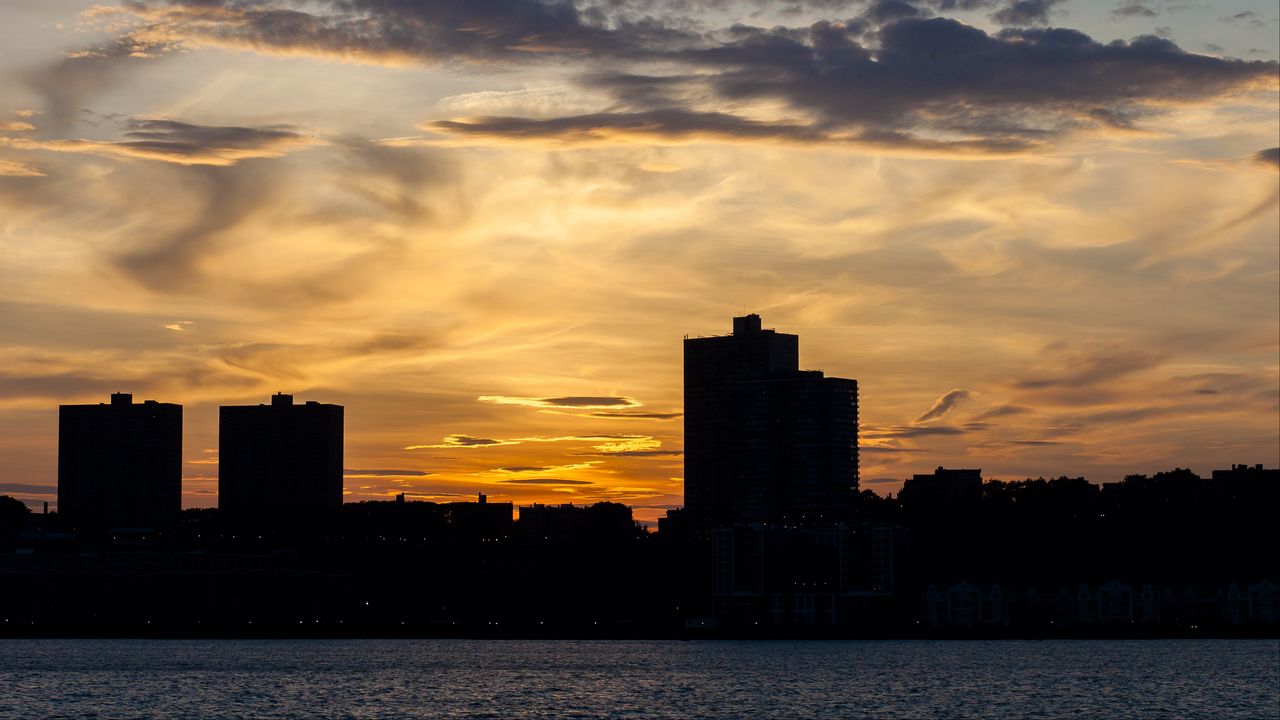 Wallpaper building, silhouette, sea, sunset, sky