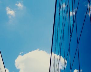 Preview wallpaper building, sky, clouds, glass, blue