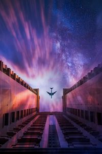 Preview wallpaper building, sky, plane, night, architecture