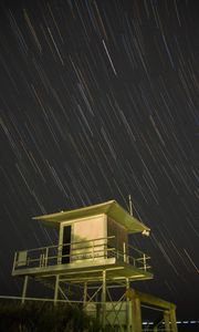 Preview wallpaper building, sky, stars, long exposure, night