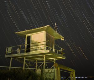 Preview wallpaper building, sky, stars, long exposure, night