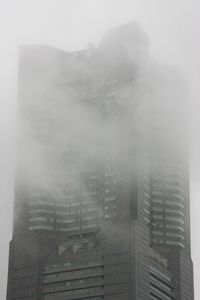 Preview wallpaper building, skyscraper, fog, architecture