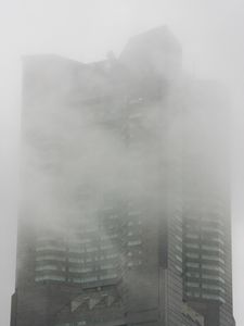 Preview wallpaper building, skyscraper, fog, architecture