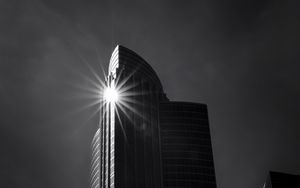 Preview wallpaper building, skyscraper, glare, rays, bw