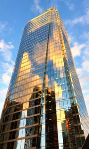 Preview wallpaper building, skyscraper, glass, sky, clouds, bottom view