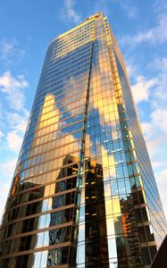 Preview wallpaper building, skyscraper, glass, sky, clouds, bottom view