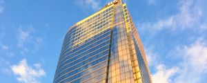 Preview wallpaper building, skyscraper, glass, sky, clouds, bottom view