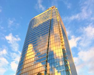 Preview wallpaper building, skyscraper, glass, sky, clouds, bottom view