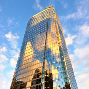 Preview wallpaper building, skyscraper, glass, sky, clouds, bottom view