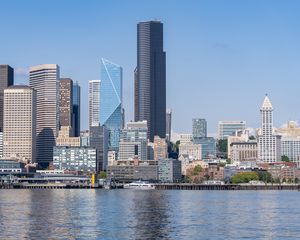 Preview wallpaper building, skyscrapers, river, ship, embankment