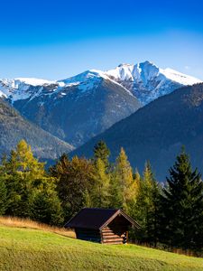 Preview wallpaper building, slope, trees, mountains, snow, nature