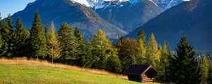 Preview wallpaper building, slope, trees, mountains, snow, nature