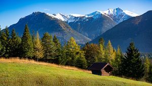 Preview wallpaper building, slope, trees, mountains, snow, nature
