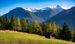 Preview wallpaper building, slope, trees, mountains, snow, nature