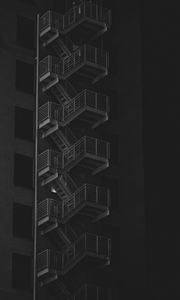 Preview wallpaper building, stairs, bw, railings, night