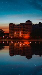 Preview wallpaper building, starry sky, architecture, sunset, reflection