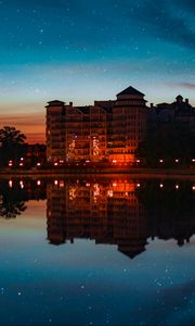 Preview wallpaper building, starry sky, architecture, sunset, reflection