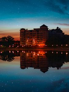 Preview wallpaper building, starry sky, architecture, sunset, reflection