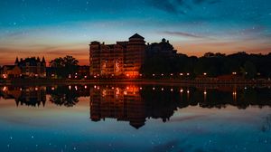 Preview wallpaper building, starry sky, architecture, sunset, reflection