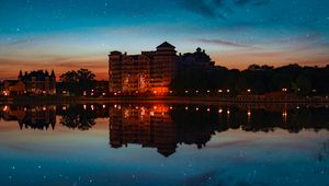 Preview wallpaper building, starry sky, architecture, sunset, reflection