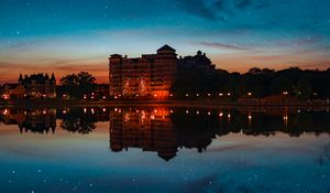 Preview wallpaper building, starry sky, architecture, sunset, reflection