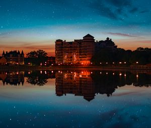 Preview wallpaper building, starry sky, architecture, sunset, reflection